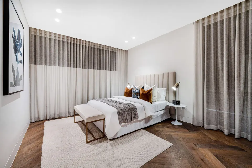 Motorised wave sheers and roller blinds in a main bedroom, Hurstville Grove