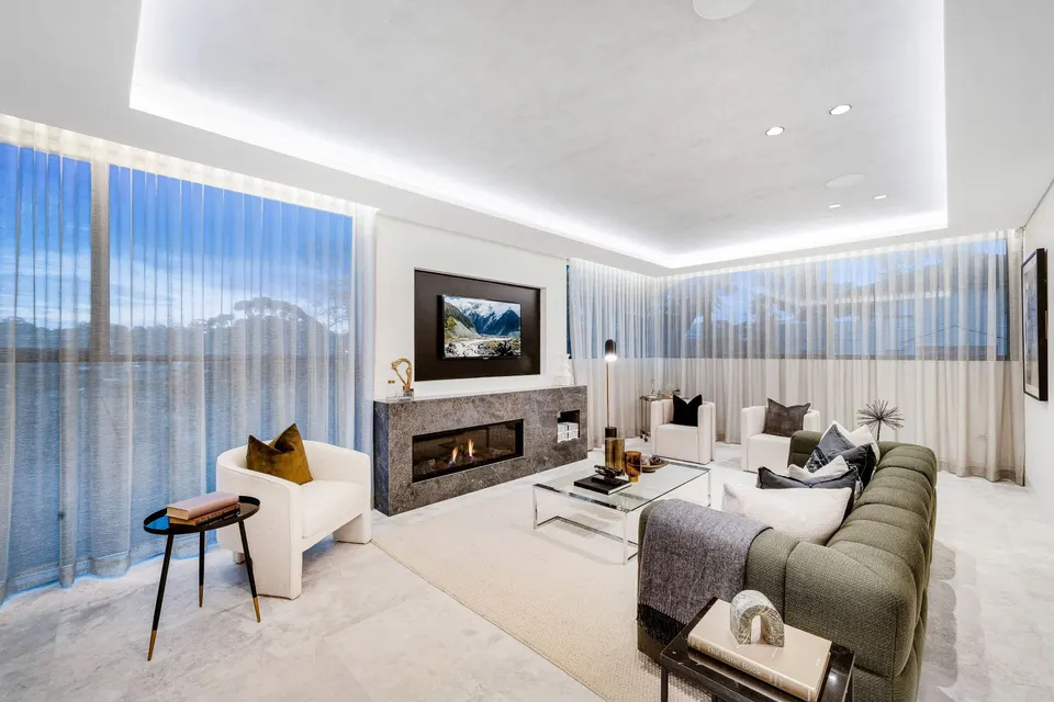 Motorised wave sheers and roller blinds in a Hurstville Grove living room, by Lifestyle Curtains