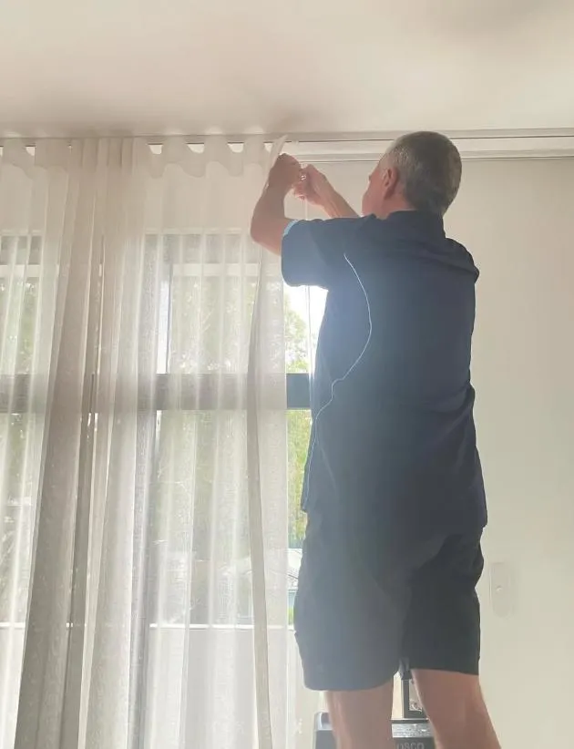 Fitting sheer curtains to a ceiling track
