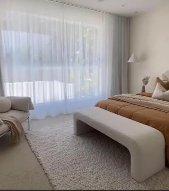 Soft sheer curtains in a calm bedroom