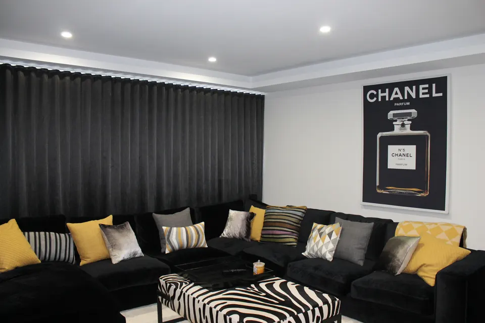 Black velvet blockout curtains in a home theatre, Monterey